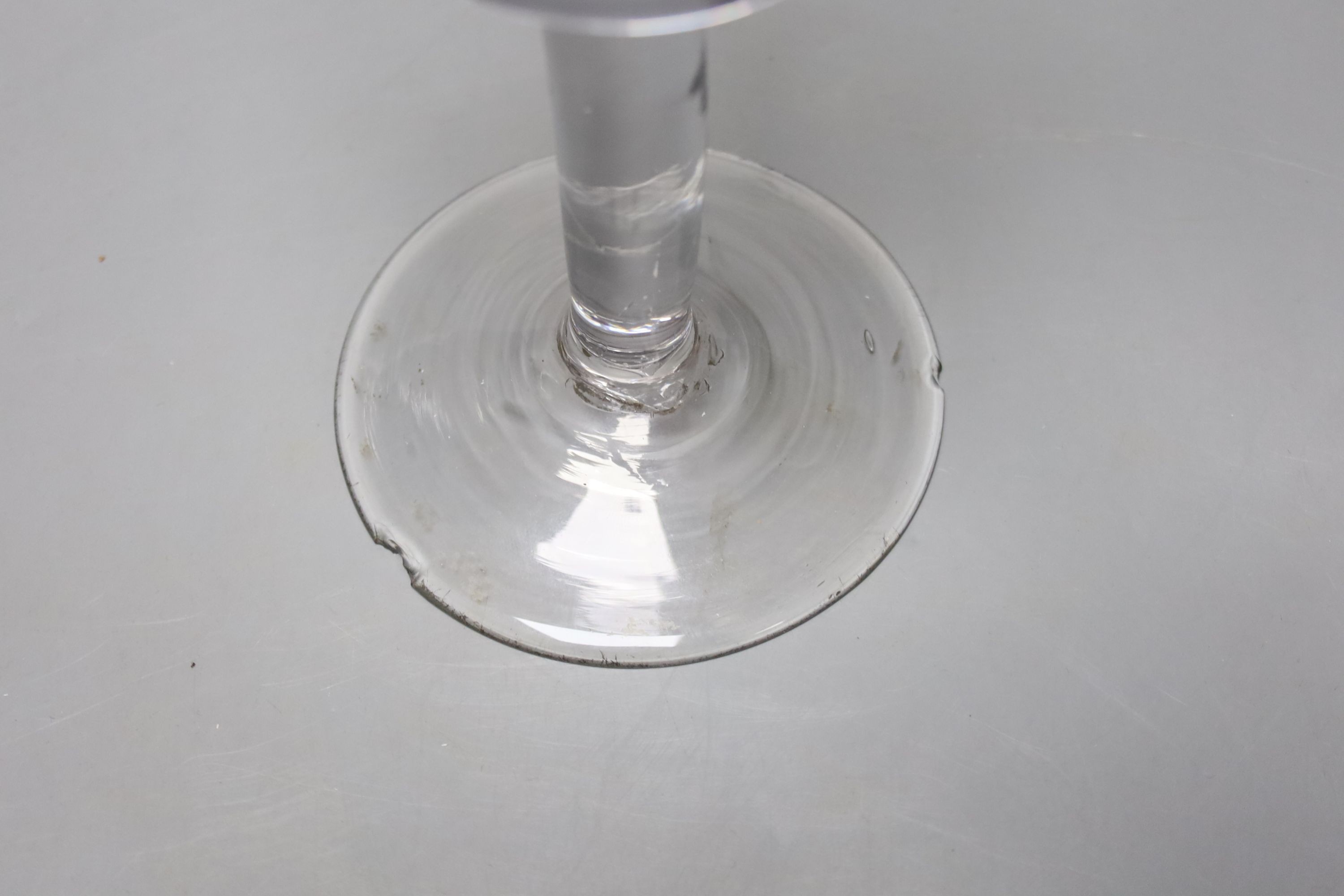 A mid 18th century glass wine goblet, bucket bowl, height 21cm